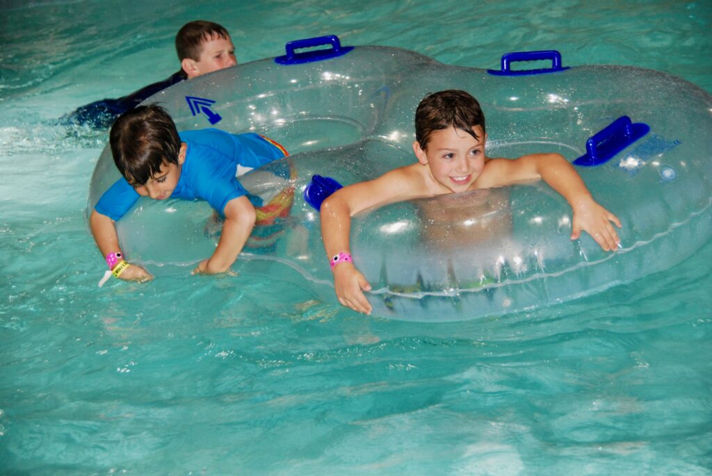 kids on floats in lazy river