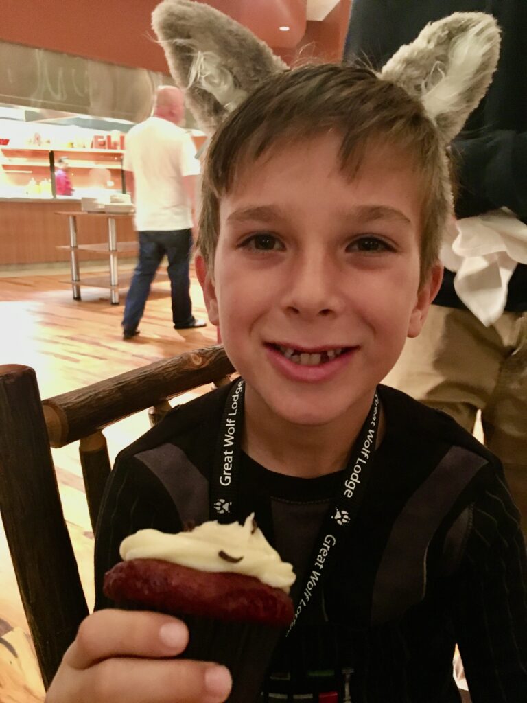 boy with cupcake