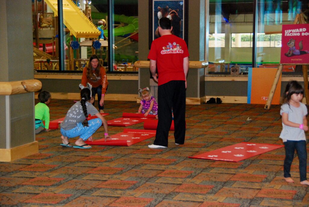 kids by yoga mats