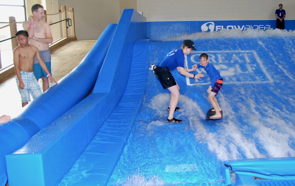 boy on surf simulator