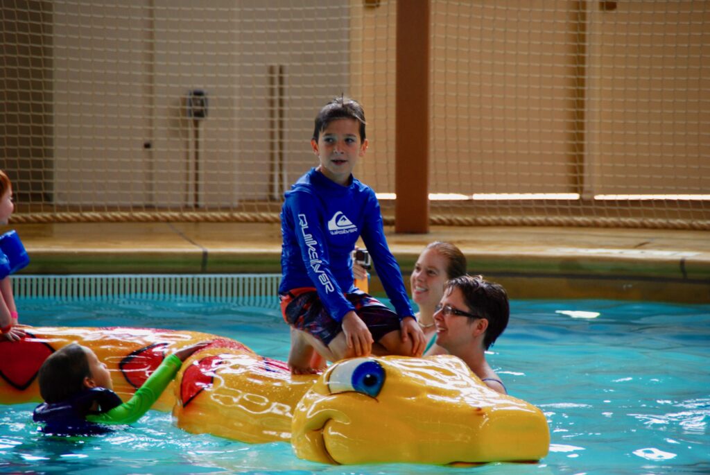 boy on yellow alligator