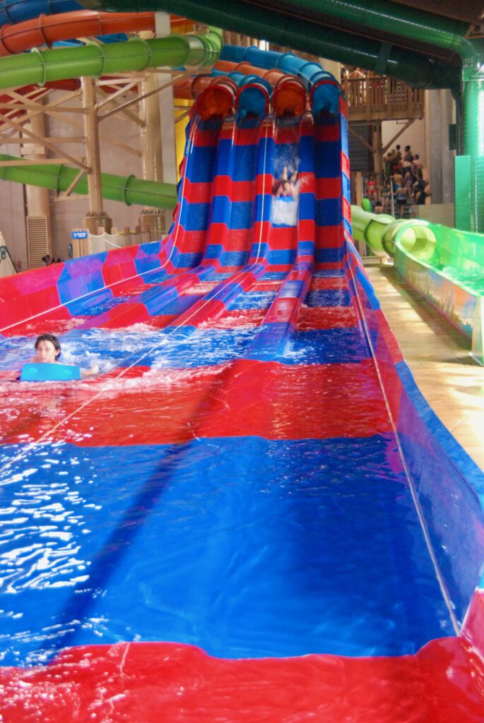 blue and red stripped water slide