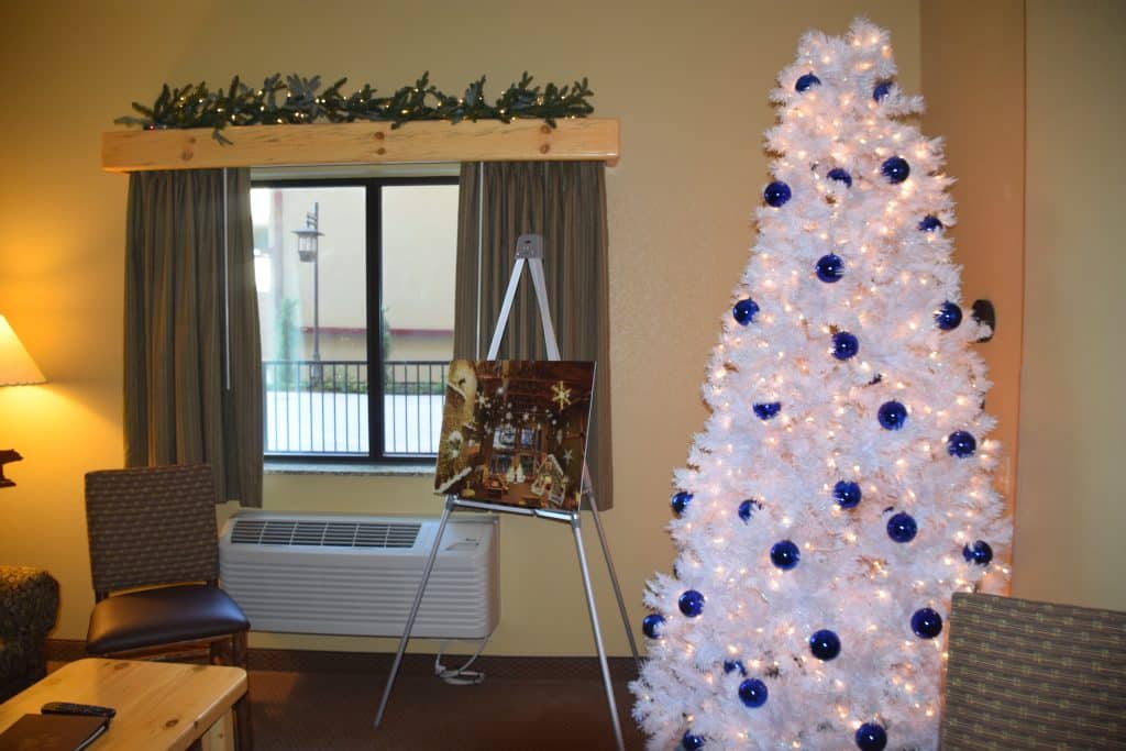 white christmas tree with blue ornaments - Great Wolf Lodge Spooktacular