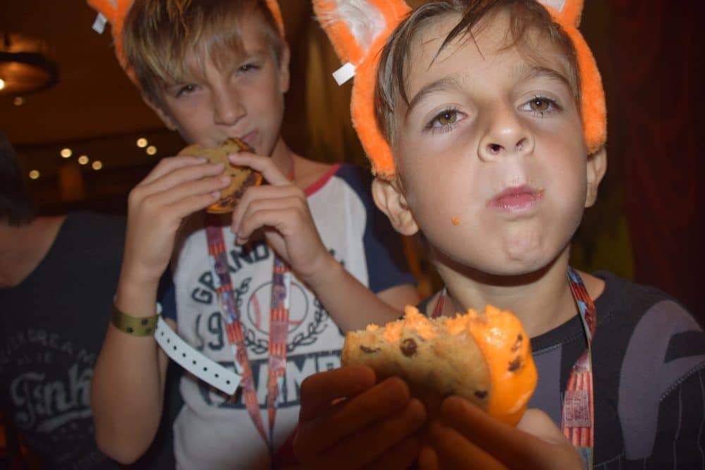 boys eating orange sandwich ice creams - Great Wolf Lodge Spooktacular