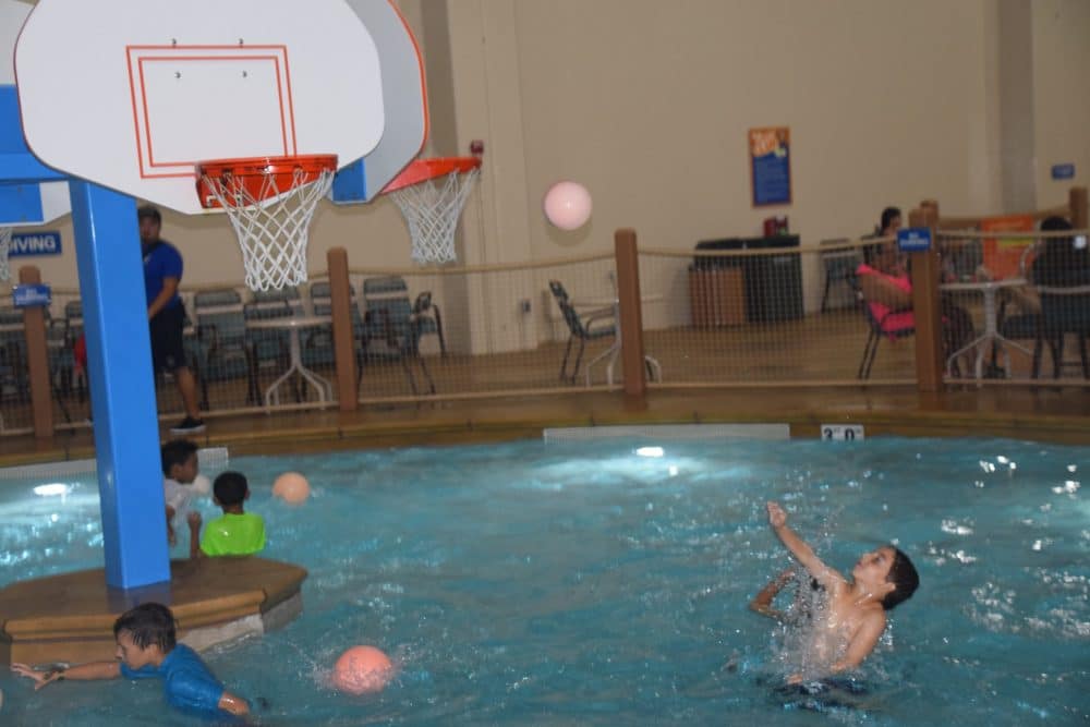 boy shooting baskets in pool - Great Wolf Lodge Spooktacular