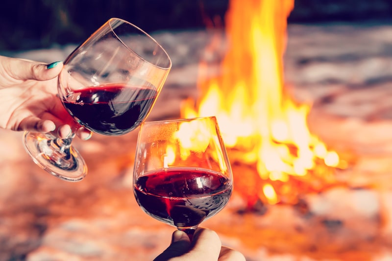 wine next to campfire - Romantic Trip to Lake Nacimiento