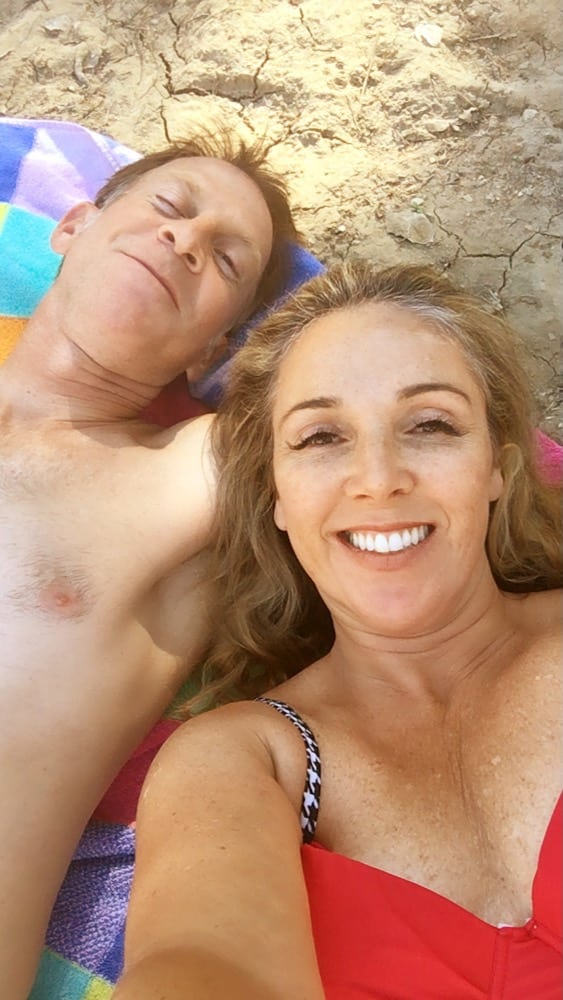 couple laying on the sand - Romantic Trip to Lake Nacimiento - 