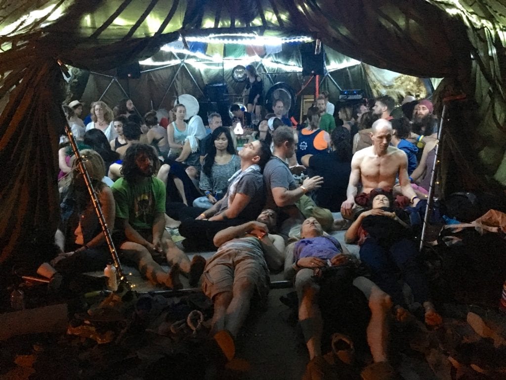 people sitting in the Sound Dome at Bhakti Fest - Finding Your Alternate Universe at Shakti Fest