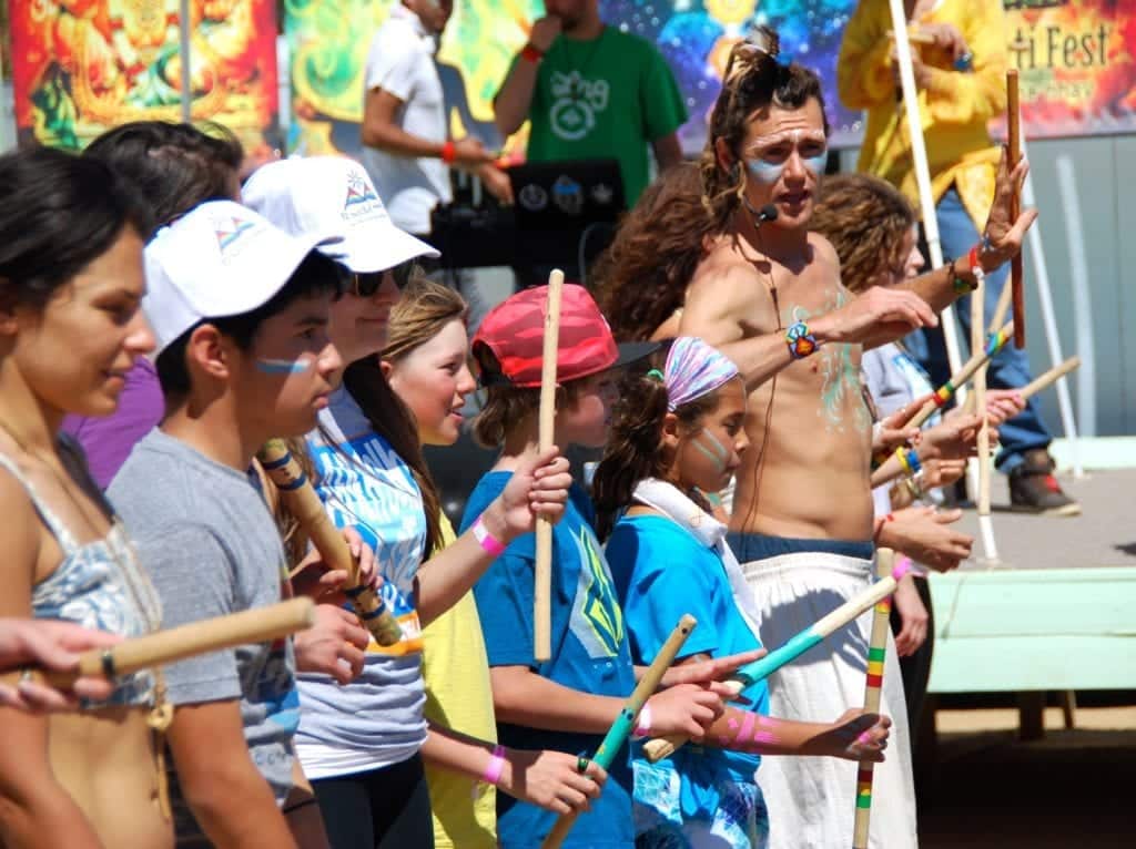 kids with painted faces praising - Bhakti Fest - Finding Your Alternate Universe at Shakti Fest