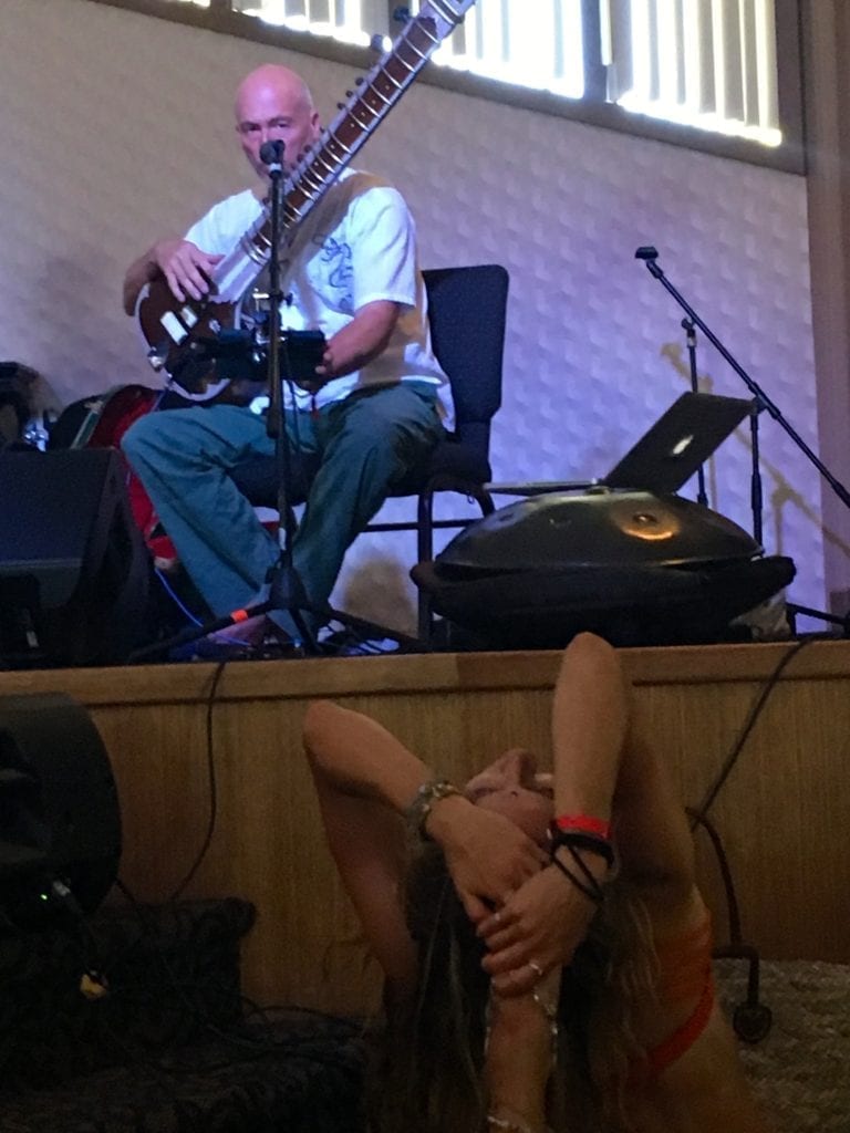 man playing instrument- Finding Your Alternate Universe at Shakti Fest