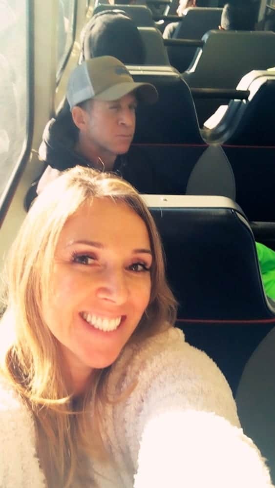 Couple taking selfie - 7 Ways to Survive Traveling With Babies and Kids