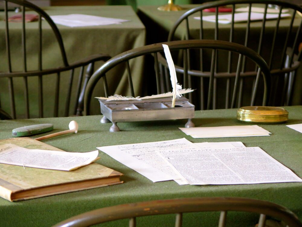 sheets of paper on a desk -  Philadelphia with Teens - 4 Spots in Philadelphia To Make History Cool With Teens
