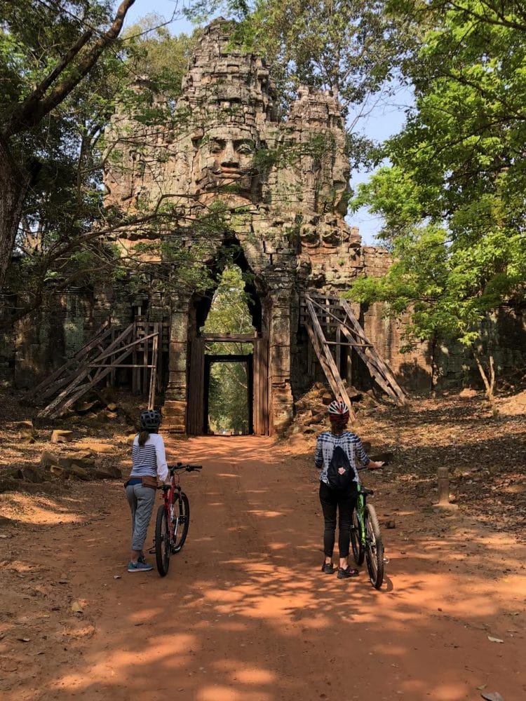 women biking - 7 Tips for Traveling with Girlfriends