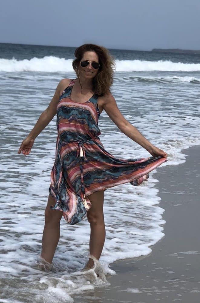 women at the beach - 7 Tips for Traveling with Girlfriends