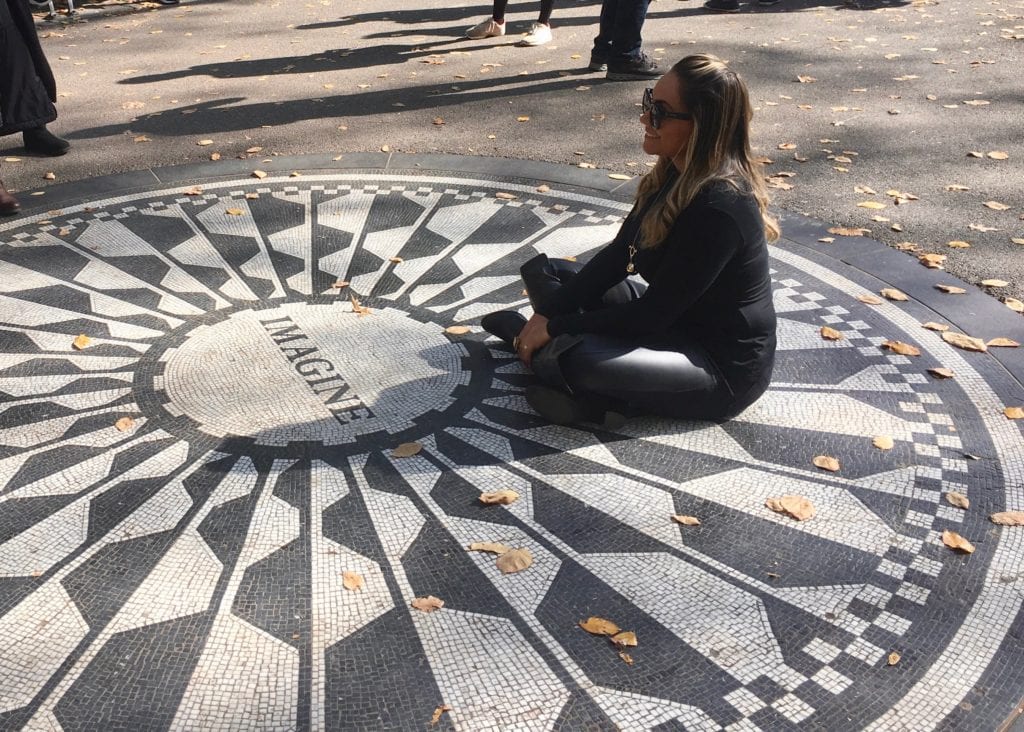 women sitting on Imagine memorial to John Lennon - © Samantha Davis-Friedman - Walking the Streets of NYC: 2 Tours with Kids & Teens