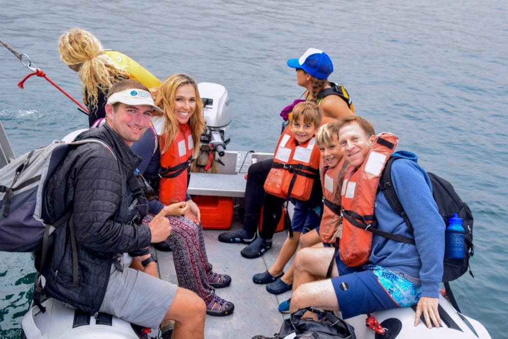 family in dinghy - cave kayaking channel islands