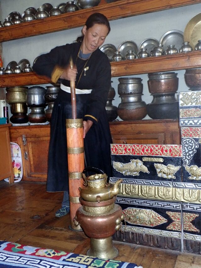 Women Making butter tea - volunteer family travel to India - A Magical Family Adventure in India