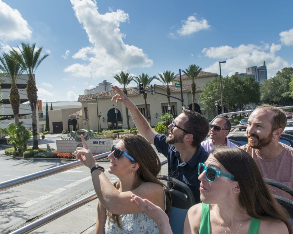 Hop-on, Hop-off bus tourists in Orlando - Photo Courtesy of isango! - Hop On - Hop Off Bus Tours: An Affordable Way to Travel with Kids