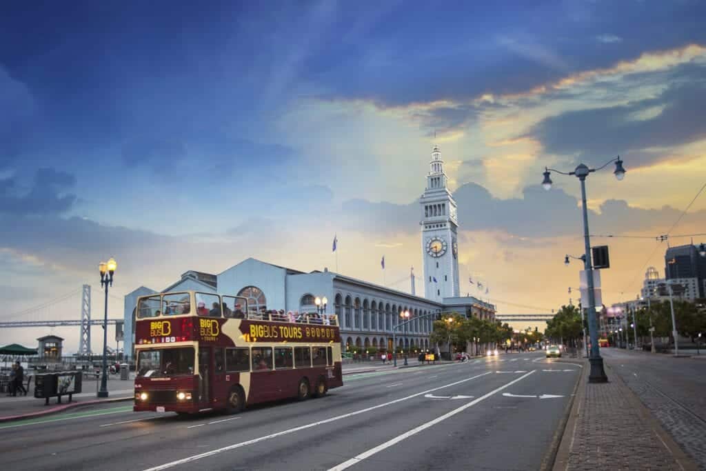 hop on hop off bus driving through city – Photo courtesy of Big Bus Tours San Francisco - Hop On - Hop Off Bus Tours: An Affordable Way to Travel with Kids