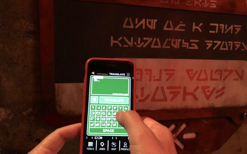 Your Data pad can translate the Aurabesh writing into English to understand what the signs say. Photo by Joshua Friedman