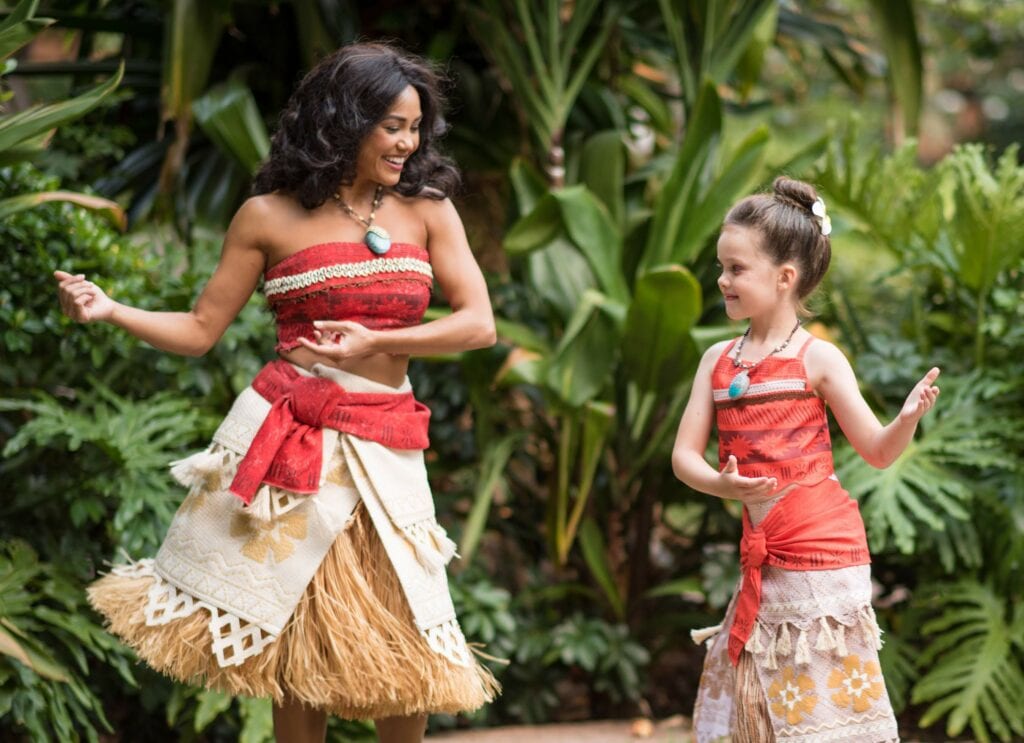 2 girls hula dancing - Behind the Scenes at Disney: An Invitation to Explore