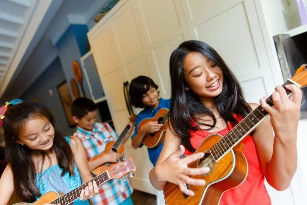 Kids playing Ukulele - Behind the Scenes at Disney: An Invitation to Explore