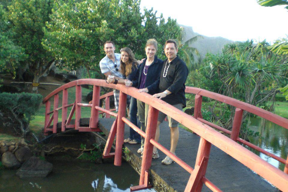 Family posing on a bridge - Escape to Kauai With Family