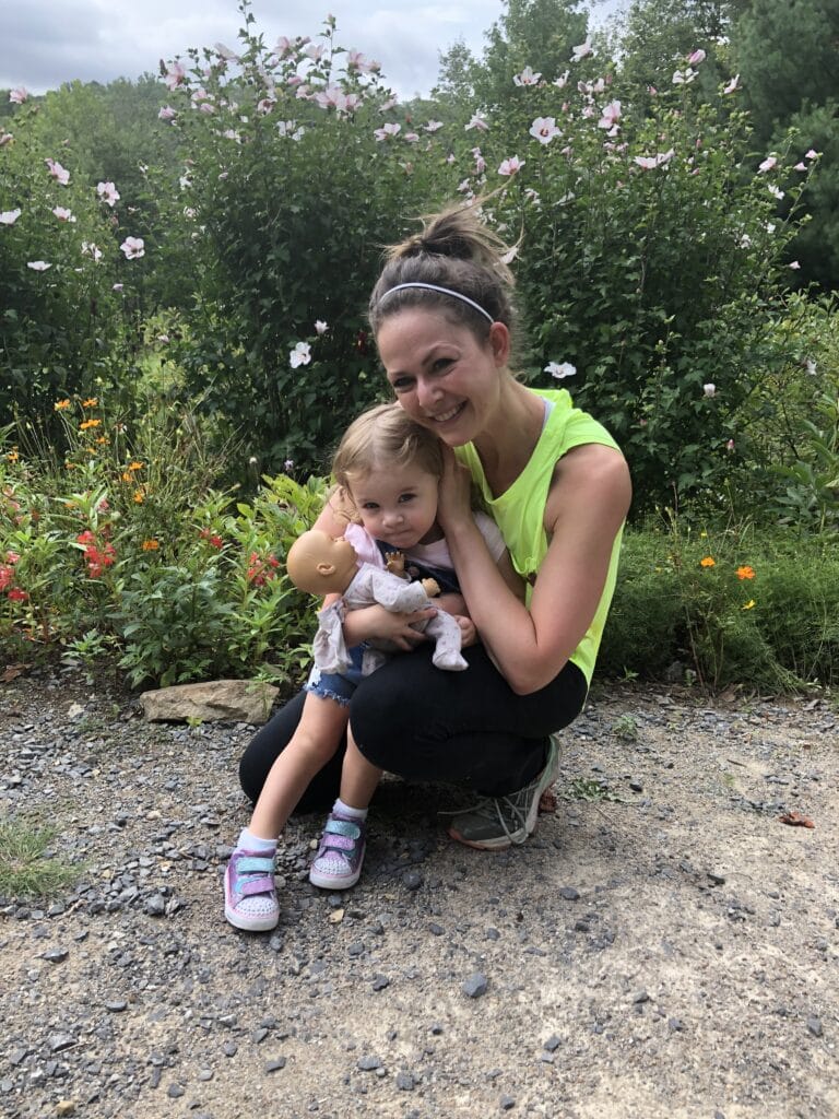 Women and daughter outside - How to Plan a Safe Labor Day Weekend with a Toddler