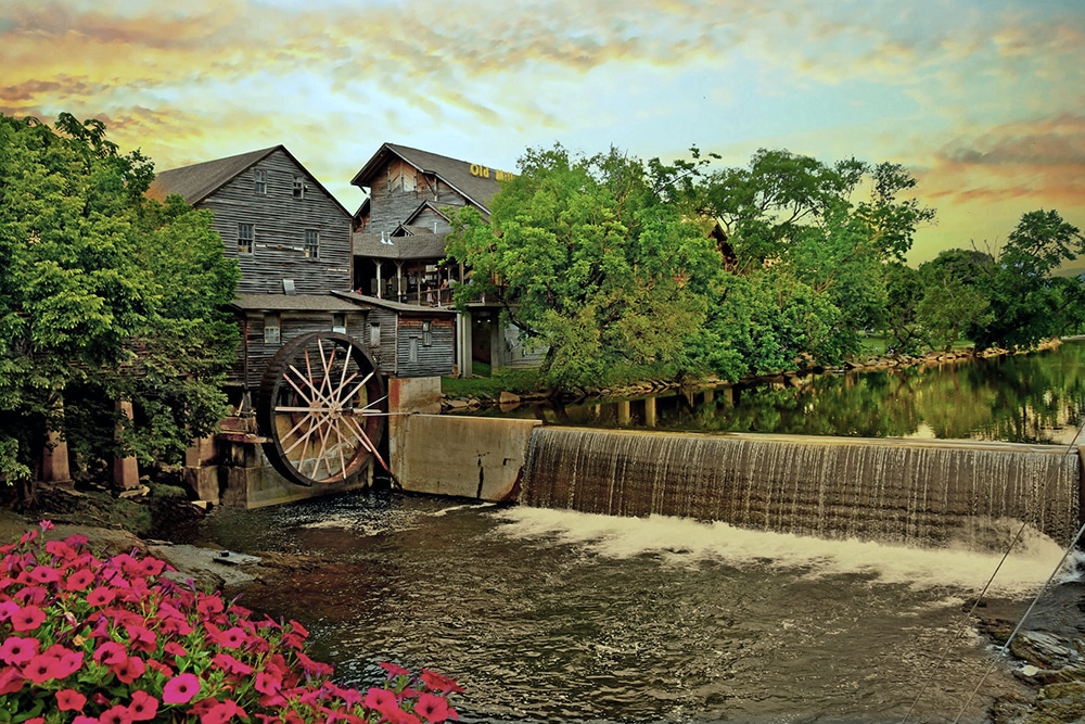 log cabin and water fall - things to do with kids great smoky mountains