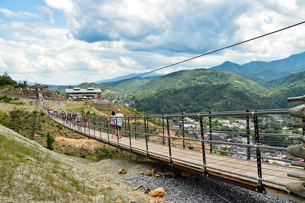people walking on bridge - things to do with kids great smoky mountains