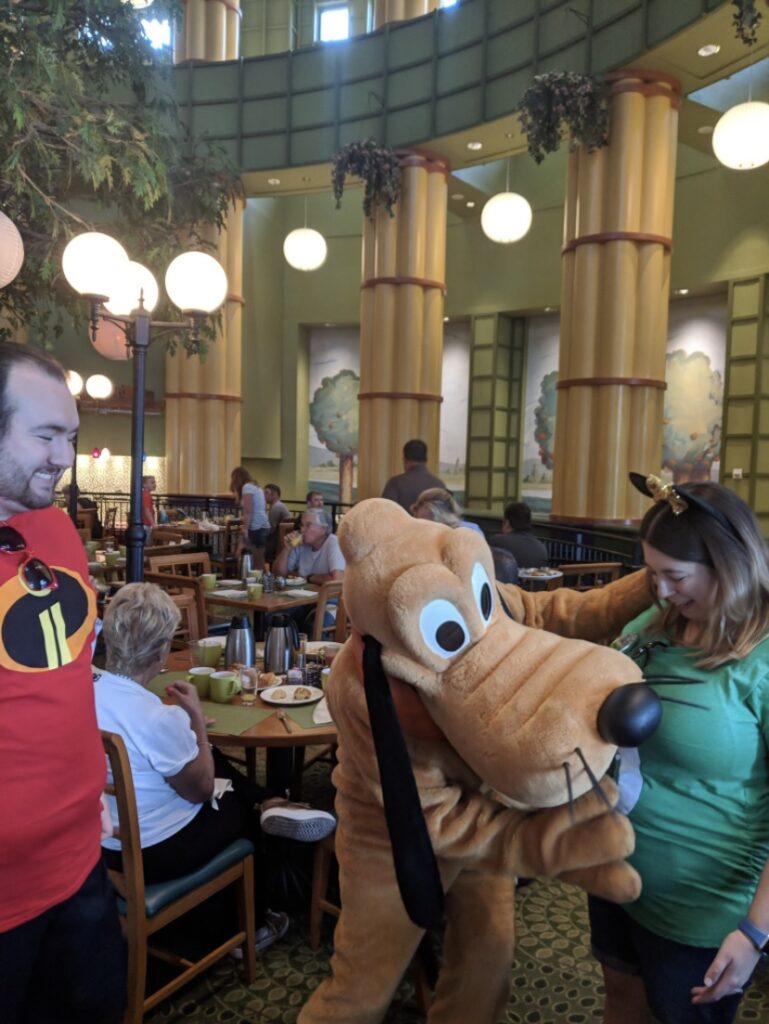 goofy touching my stomach - Helpful hints and tricks to help you enjoy your babymoon and any other travels while you've got a bun in the oven!