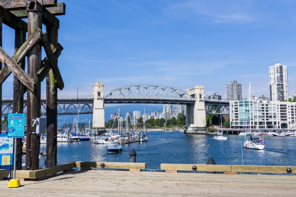 View of Granville Bridge, sailboats, and surrounding buildings.vancouver with kids how to spend the best long weekend family travel