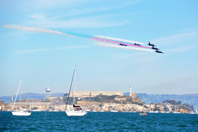 Military jets flying in formation over San Francisco Bay, with sailboats in the foreground and Alcatraz in the back. Fall in the San Francisco Bay Area: Best Things to Do with Kids family travel halloween
