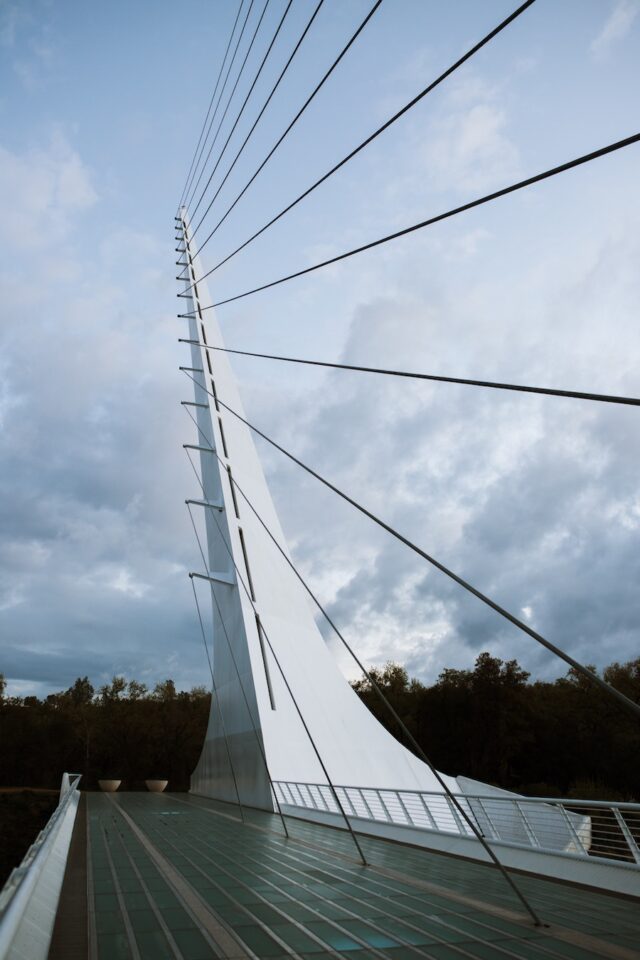 Side photo of sundial Bridge, white with black cables. Secret Redding: Discovering the Best 5 Things to do With Kids family travel