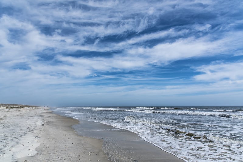 ocean lapping over sand