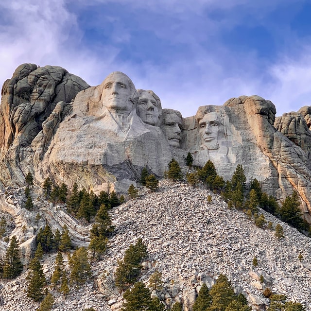 Looking Up At Mt. Rushmore.// Presidents Day Weekend Trips: Learning Vacations For Families