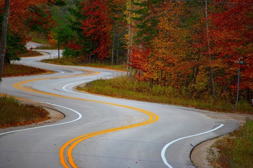 A curving, winding road in Door County, a romantic getaway destination