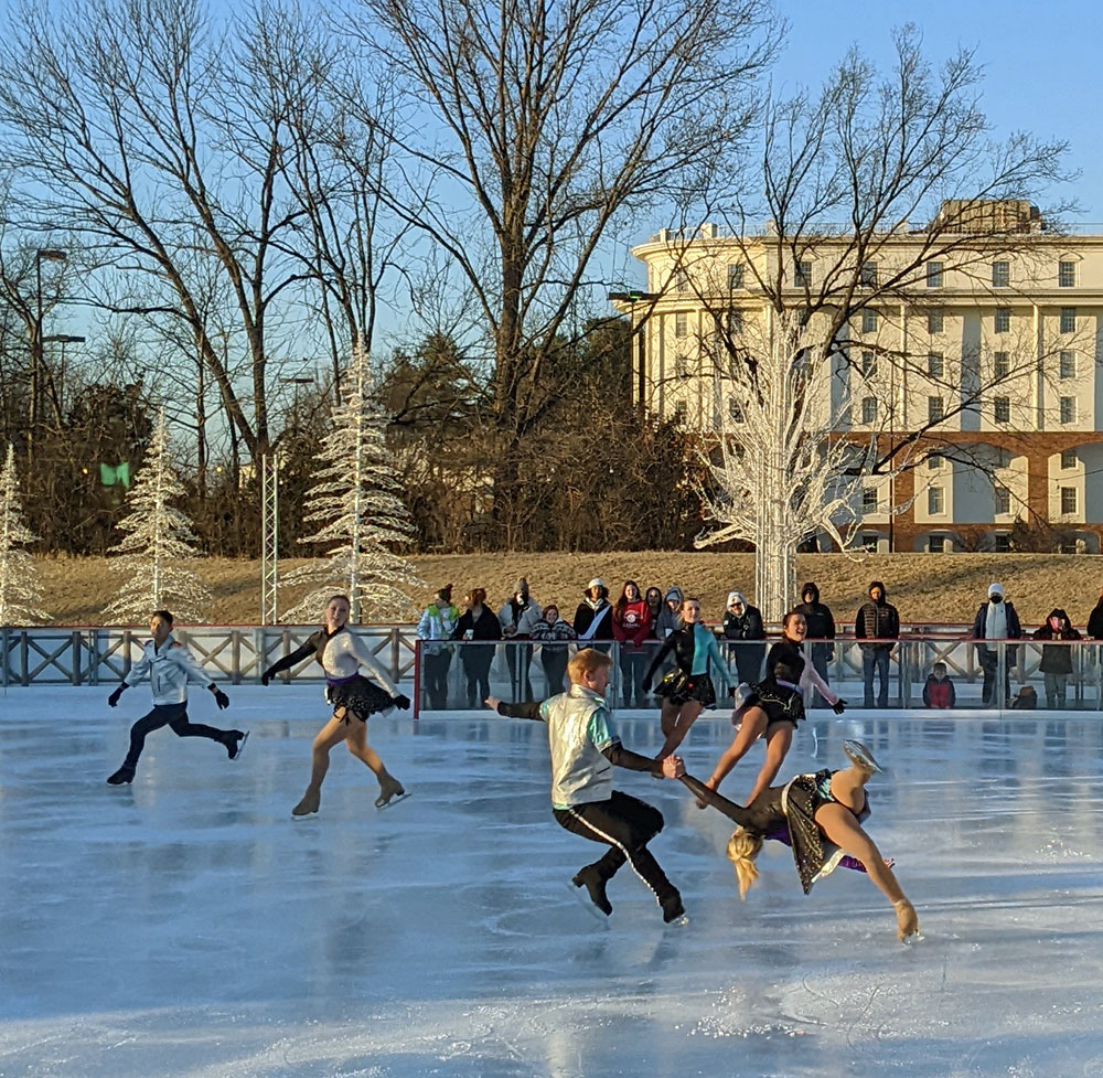 Skaters perform impressive lifts, jumps, and spins during Winterfest at Gaylord Hotels Fire & Ice Skating Show. 