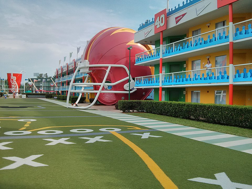 Disney All Star Sports Resort common area which looks like a football field with "plays"- Best Resorts at Disney World For Families