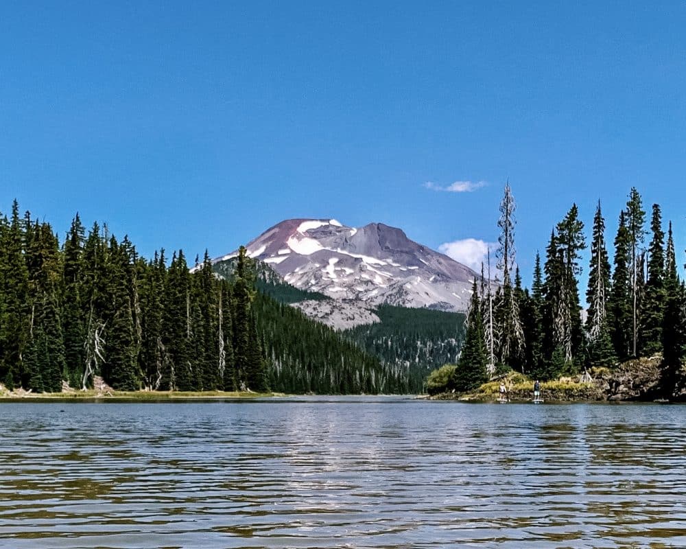 lake with mountain in background - best fall destinations in us
