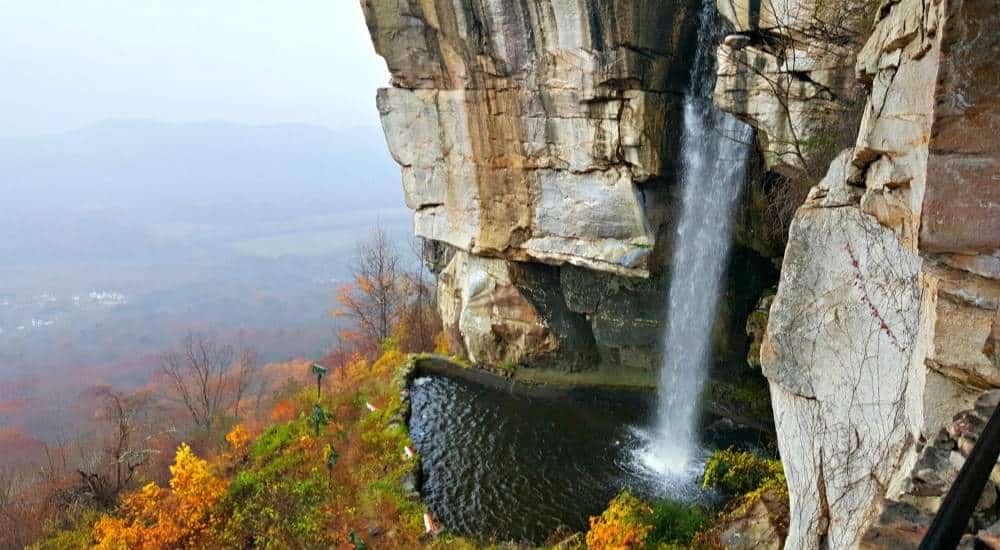 waterfalls on mountain - best fall destination in us