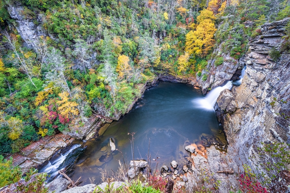 water hole between rocky cliffs - best fall vacation in the usa