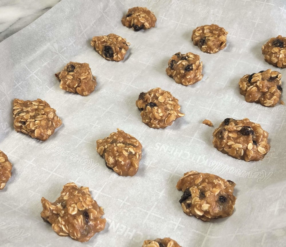 Healthy cookies on parchment paper, waiting to bake