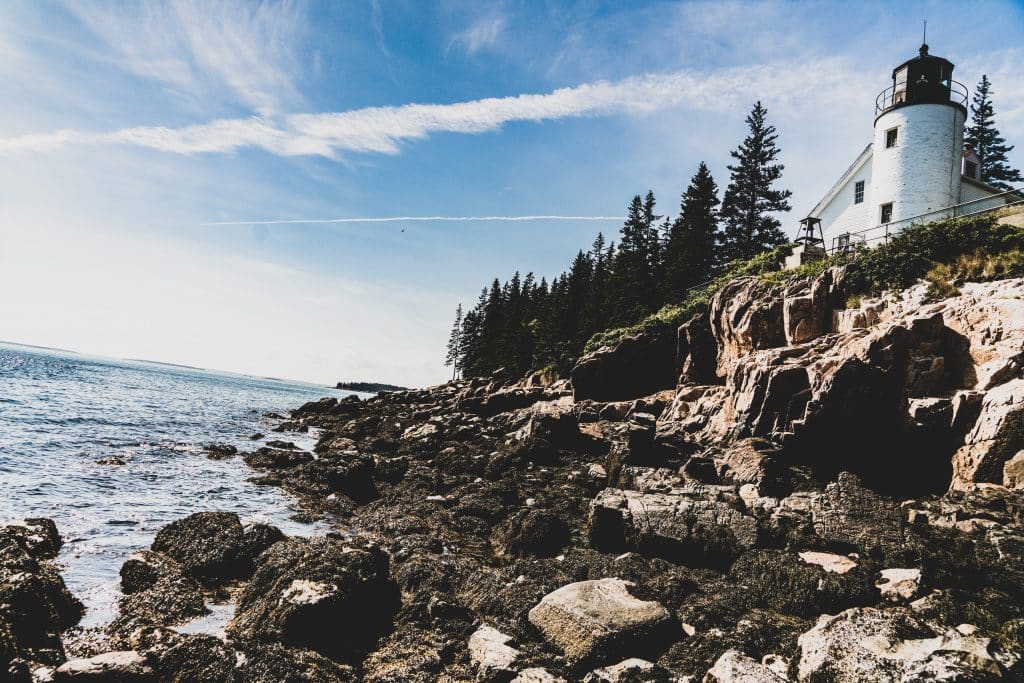 A lighthouse on the coast at Acadia National Park