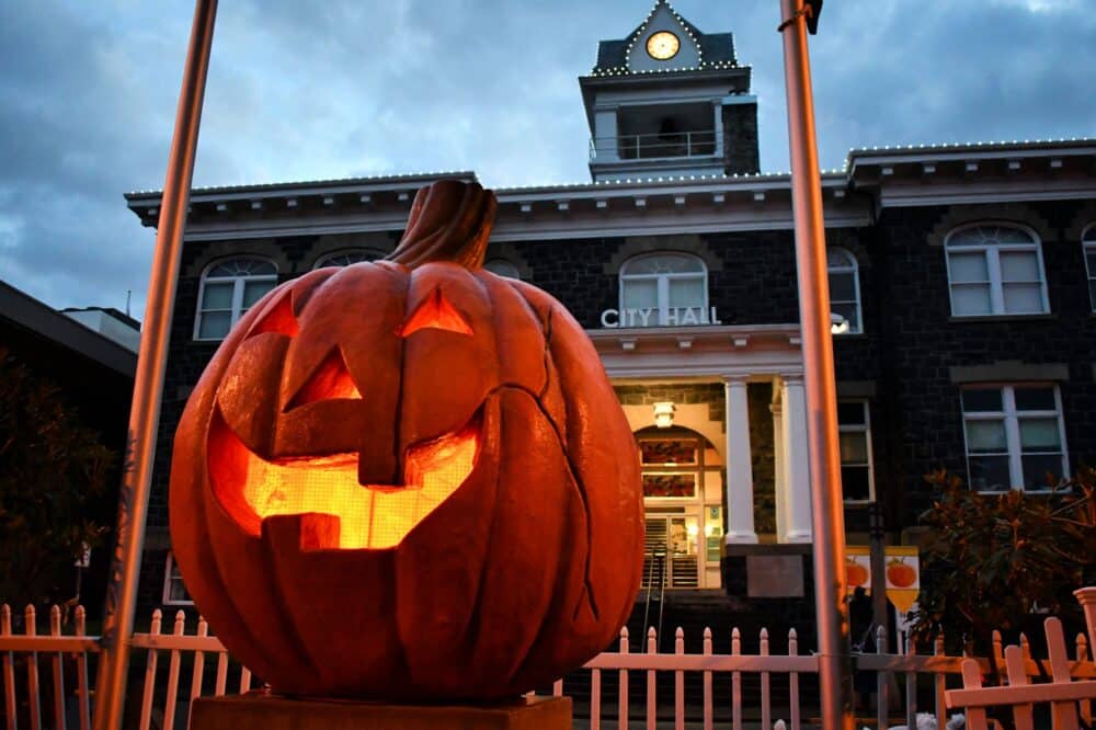 Pumpkin at night in main plaza - Spirit of Halloweentown in St. Helens, Oregon