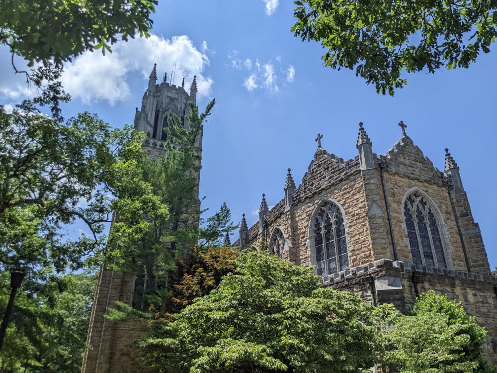 An exterior view of the gothic, stone architecture of All Saints Chapel at Sewanee, the University of the South