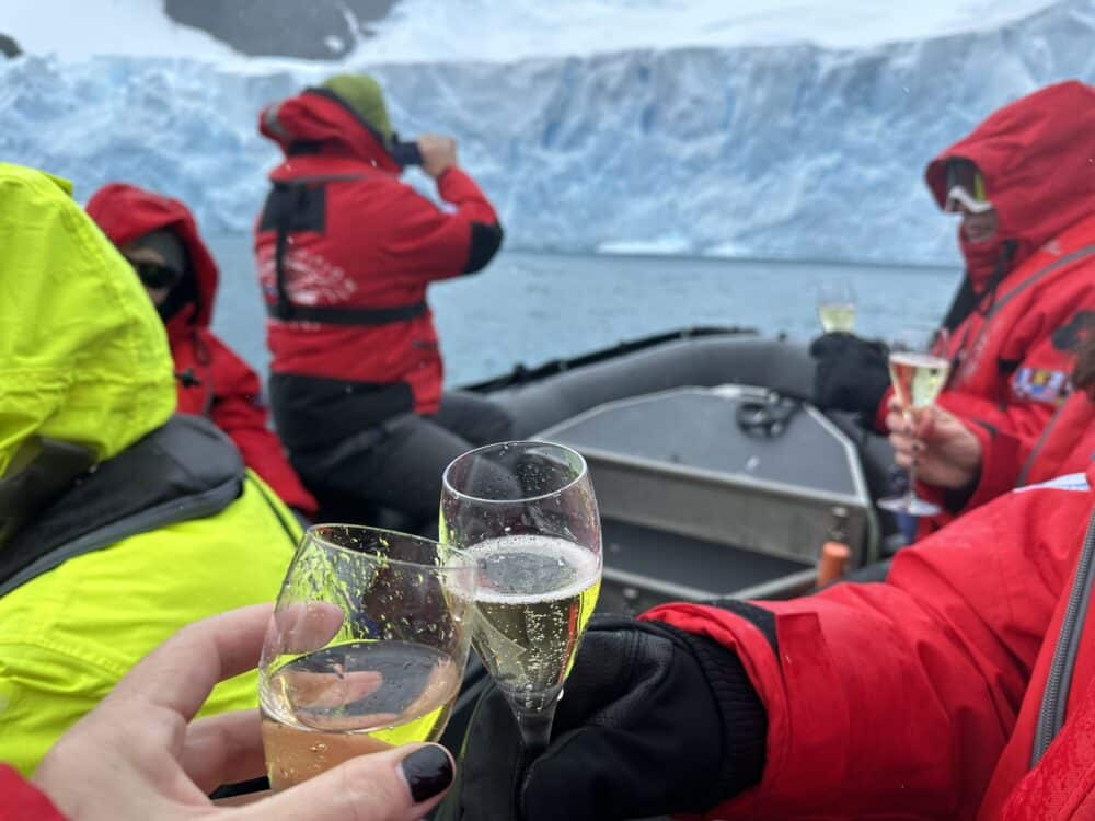 champagne toast on skift - Adventures by Disney Antarctica