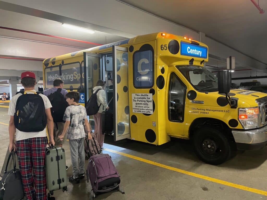 boys near the parking spot shuttle