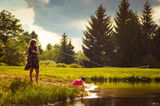kids fishing and playing in pond - Best East Coast Resorts For Families