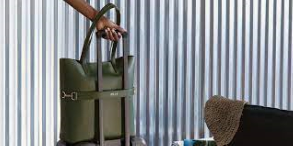 tote bag on carry-on handle - packing travel hacks